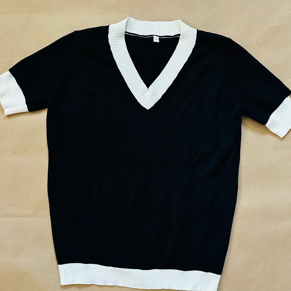 Elegant Women's Black and White V-Neck Sweater